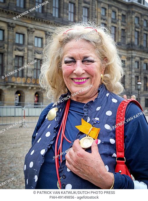 Dutch artist Marte Roling posing with the honor medal of Orange in Amsterdam, The Netherlands, 4 June 2014. Photo: Patrick van Katwijk / NETHERLANDS AND FRANCE...