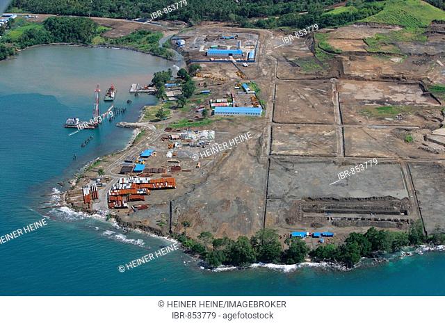 Refinery and harbour premises being built, at a nickle mine, chinese mining association, Basamuk, Papua New Guinea, Melanesia