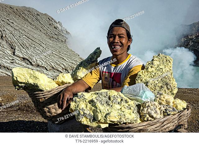 portrait of a sulphur miner in the Kawah Ijen volcanic crater, Java, Indonesia