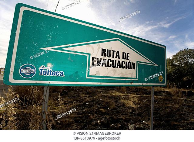 Evacuation sign in a village near the volcano Popocatépetl, Puebla, Mexico