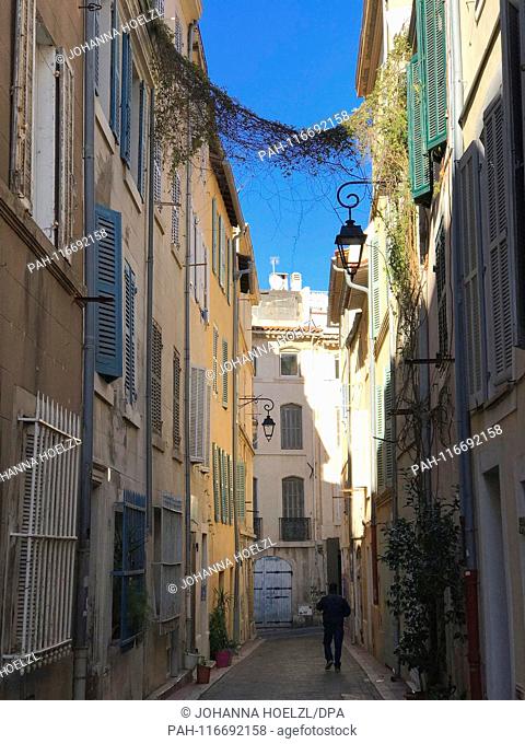 Labyrinthine narrow streets in the old town quarter Le Panier in the south french seaport Marseille - Marseille is the city of the steps and lanes January 2019...