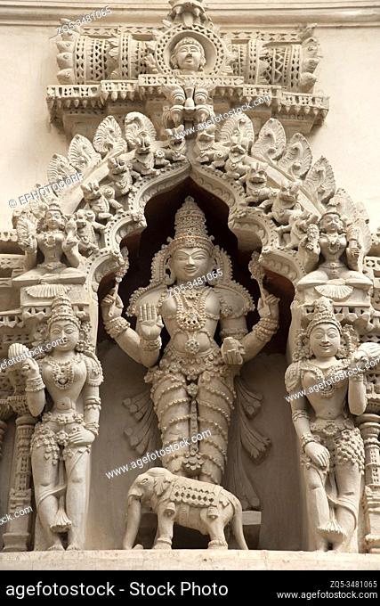Colourful carved idols on the inner wall of Jain Mutt, Shravanabelagola, Karnataka, India