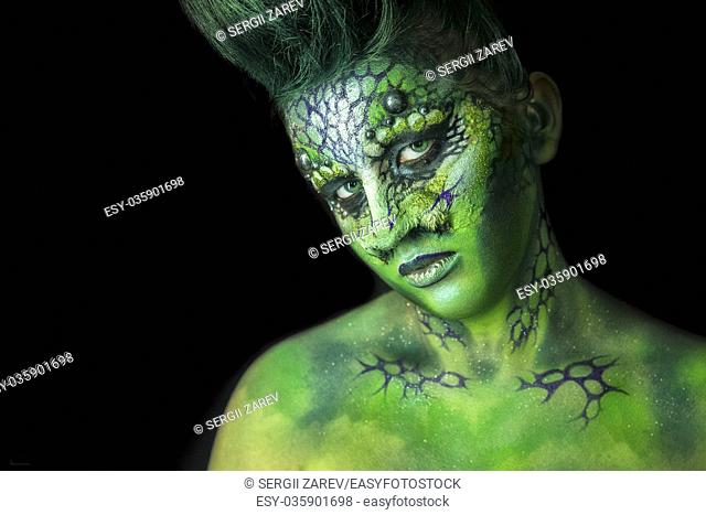 Fantastic Reptilian Girl. Creative Make up like Alien or Superhero Movie
