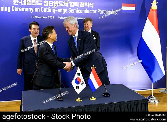 King Willem-Alexander of The Netherlands and President Yoon Suk Yeol of South Korea at ASML Hoofdkantoor Veldhoven, on December 12, 2023