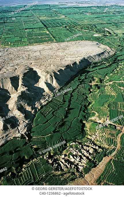 Famous for its grapes and melons: the Valley of Grapes near Turfan in the Turfan Depression, Xinjiang, China Irrigation by karez