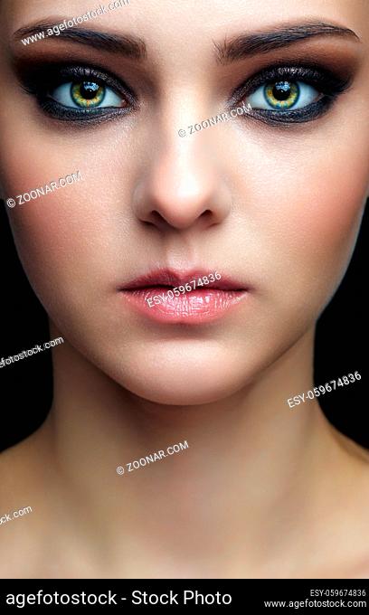 Closeup shot of human female face. Woman with natural face and eyes beauty makeup