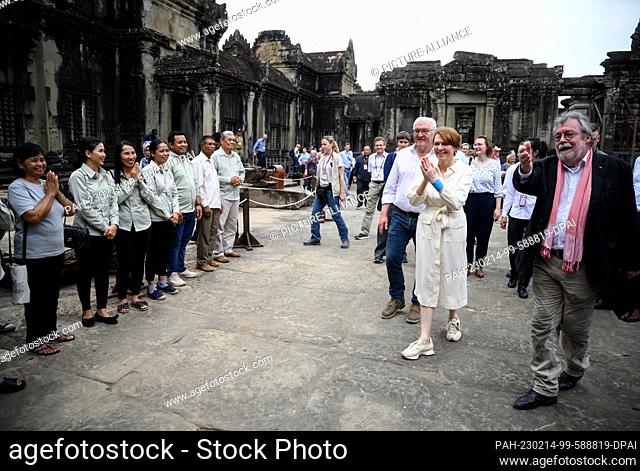 14 February 2023, Cambodia, Siemreab: German President Frank-Walter Steinmeier and his wife Elke Büdenbender are informed by Hans Leisen (r) about the German...