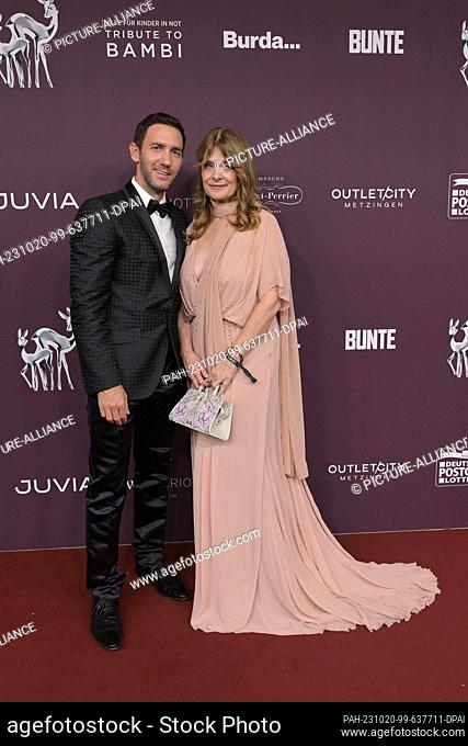 19 October 2023, Berlin: Marcel Remus and Nastassja Kinski (from left) present themselves on the red carpet at the charity event ""Tribute to Bambi""