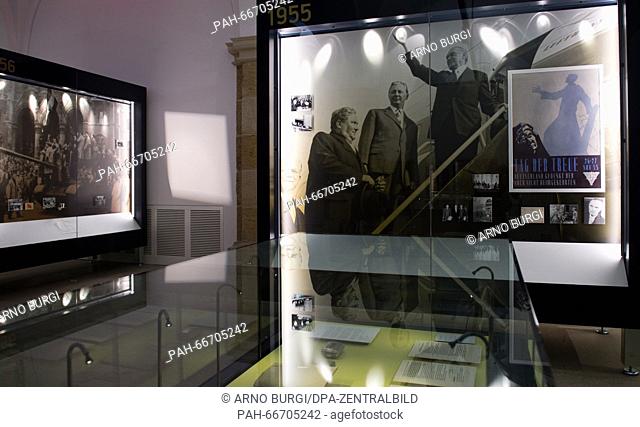 Posters, a photograph featuring Konrad Adenauer (R), the first Chancellor of the Federal Republic of Germany, and other items dated after 1955 are on display in...