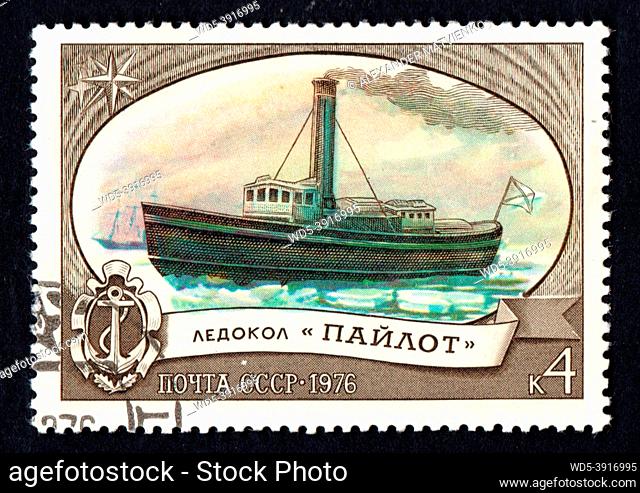 USSR - CIRCA 1976: Russian icebreaker Pilot imaged on postage stamp. World first steam-powered and metal-ship icebreaker of modern type
