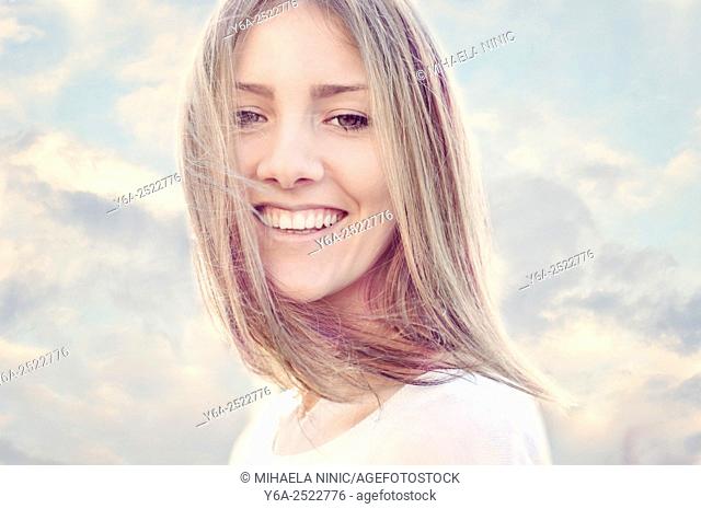 Smiling young adult woman portrait