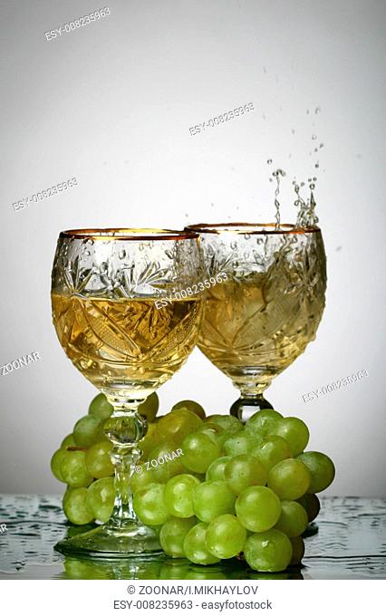 champagne splash grape and green bottle