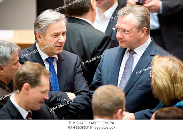 Governing mayor of Berlin Klaus Wowereit (L) and Berlin Senator of the Interior Frank Henkel (R) attend a special meeting on the renewed delay of the new Berlin...
