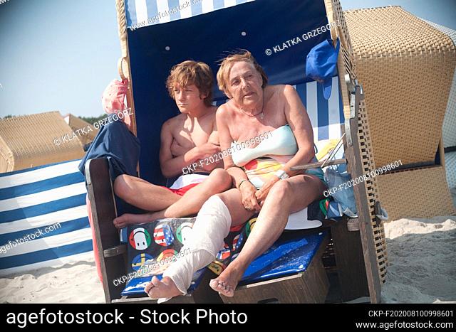 Poland, Jurata 16.08.2015. The elder lady with a boy in the beach chair in the famous luxury resort on the Hel peninsula. Photo CTK/Grzegorz Klatka