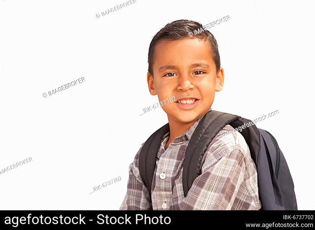 Happy young hispanic boy with backpack ready for school isolated on a white background