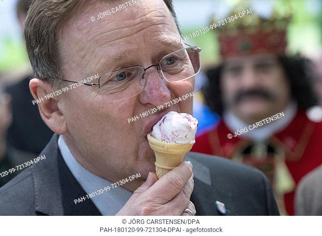 Thuringia's Minister Bodo Ramelow of the Left Party tries goat milk ice-cream at the Green Week fair in Berlin, Germany, 20 January 2018