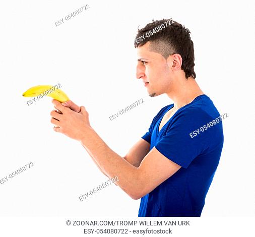 Man shooting with a banana