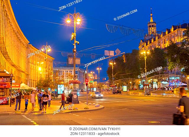 KIEV, UKRAINE - JUNE 13, 2018: People walking by Khreschatyc street. Khreshchatyk is the main street of Kiev - the capital of Ukraine