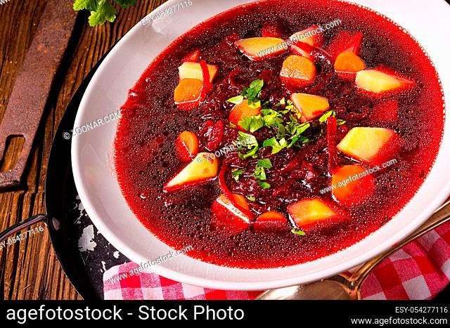 Delicious beetroot borscht with egg