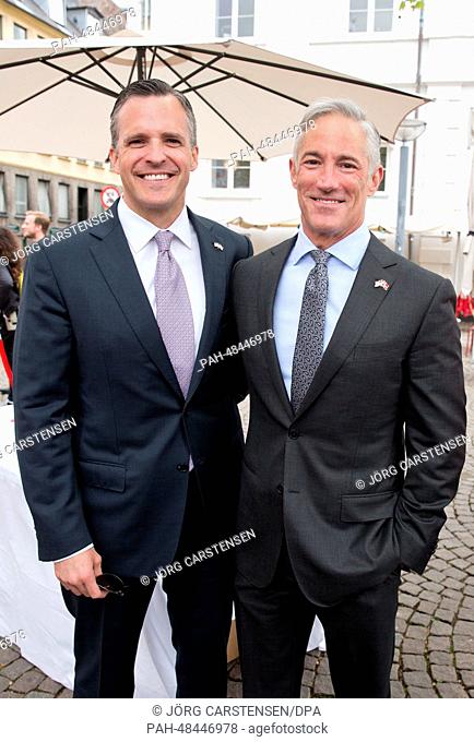 American ambassador Rufus Gifford (l) and his partner Stephen DeVincent are guests at a public same-sex marriage beside the Eurovision Song Contest 2014 in...