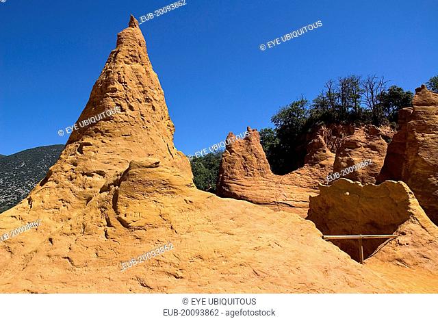 Colorado Provencal. Cheminee de Fee or Fairy Chimneys. General view from summit of eroded ochre rock cliff and peaks
