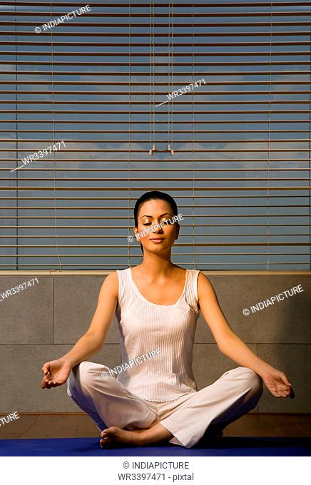 Woman practicing Yoga
