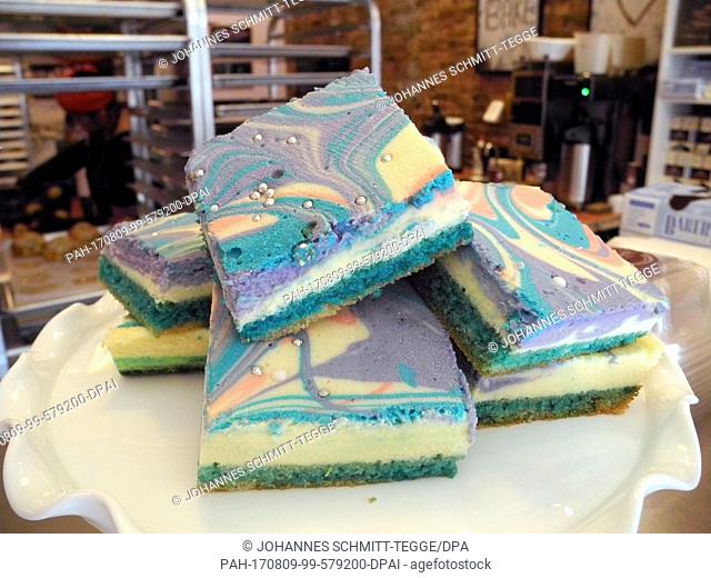 Slices of multicoloured 'unicorn cheesecake' on sale in the Buttermilk Bakeshop in New York, United States, 1 August 2017