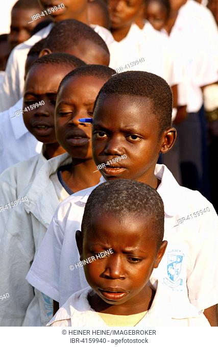 Group of students in schoolyard during morning assembly, Kasongo-Lunda, Kawongo district, Bandundu Province, Congo Republic