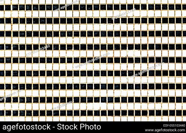 Black and white ceramic colorful tiles mosaic composition pattern background. Abstract colorful mosaic texture