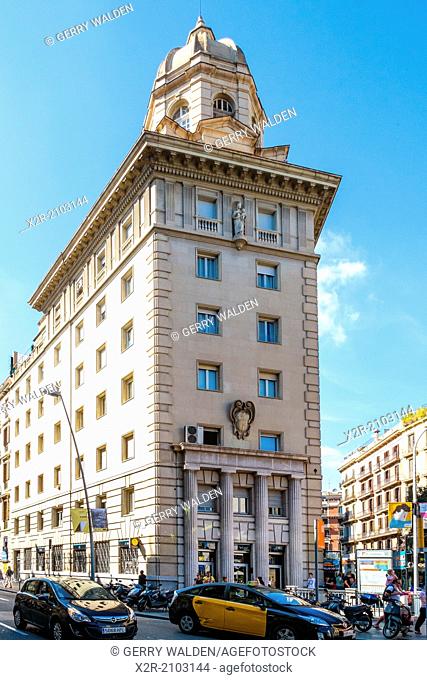 Impressive stone-faced building on the Carrer de Pelai in Barcelona