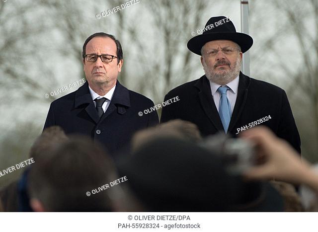 French President François Hollande and Rabbi René Gutman of Strasbourg speak during a commemoration at a Jewish cemetery in Sarre-Union, France