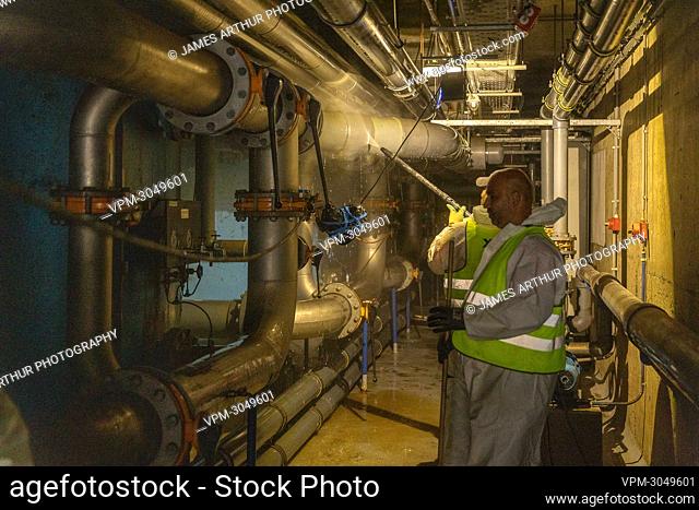Illustration picture shows workers inspecting technical installations at the Walibi amusement park in Wavre, on Thursday 29 July 2021