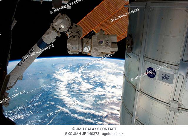 The Canadarm2 is pictured in this image photographed by an Expedition 40 crew member on the International Space Station. At the time the image was taken