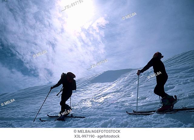 Couple cross country skiing, rear view  Pyrenees Lles  Catalonia  Spain