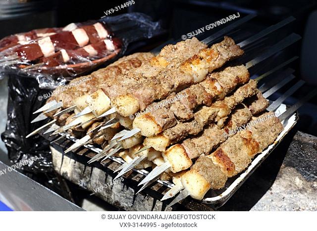 Close shot of shashlik, a uzbek regional food prepared from mutton liver in a traditional style