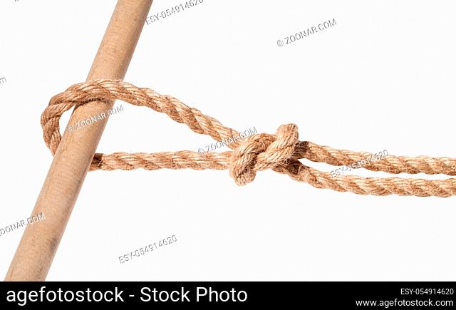 running knot tied on thick jute rope isolated on white background