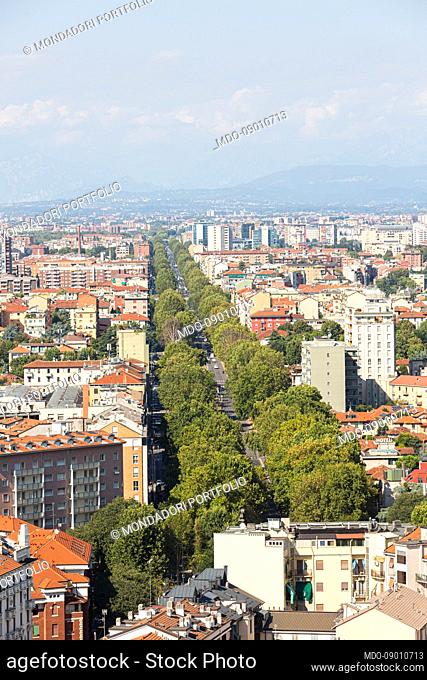 Viale Zara lined with trees that starts from piazzale Lagosta and resumes from one of the Garibaldi Towers. Milan (Italy), August 26th, 2021