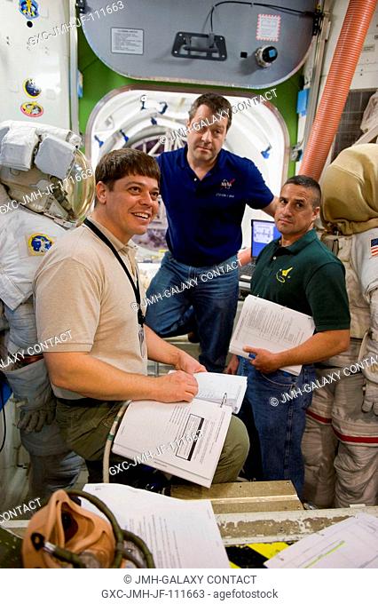 Astronaut George Zamka (right), STS-130 commander; along with astronauts Nicholas Patrick (center) and Robert Behnken, both mission specialists