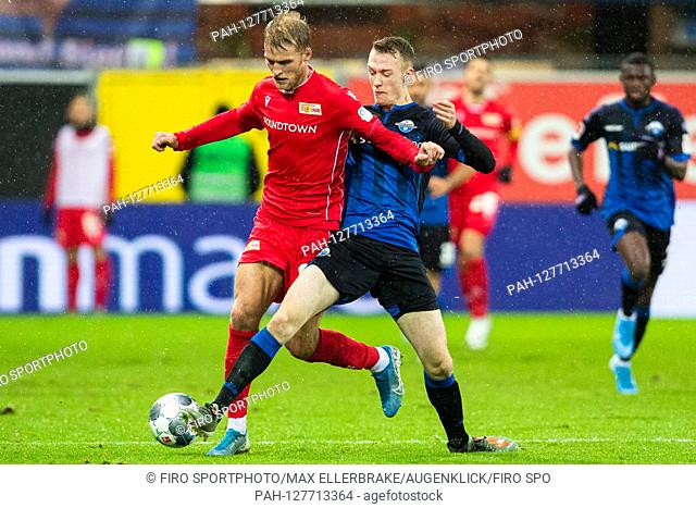 firo: 14.12.2019, Fuvuball, 1.Bundesliga, season 2019/2020, SC Paderborn - Union Berlin Florian Hvºbner (Union Berlin) in duels with Sebastian Schonlau (SC...