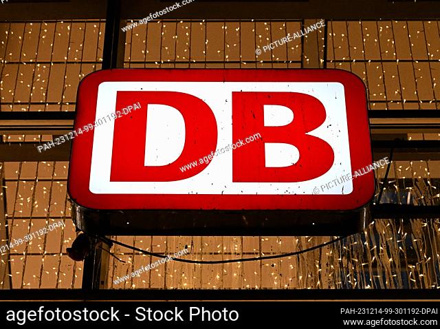 14 December 2023, Brandenburg, Potsdam: The lettering ""DB"" for Deutsche Bahn stands above the entrance to the station passages