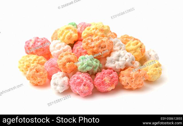 Pile of colored sugar coated peanuts isolated on white