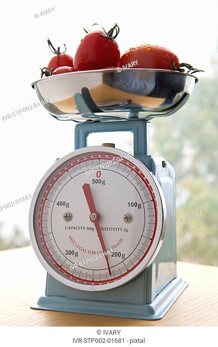 Fresh Tomato On Weighing Scale