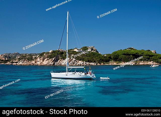 Boat sailing in the wonderful sea in Santa Maria , an island of the La Maddalena archipelago in Sardinia , Italy