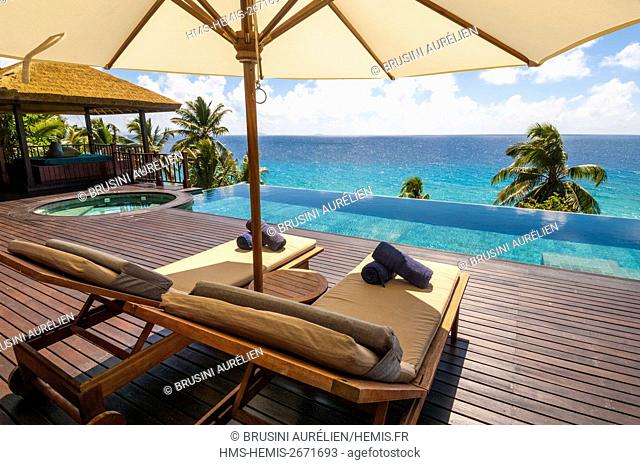 Seychelles, Fregate Island, Fregate Island Private, terrace and infinity pool from one of the 16 villas of the hotel