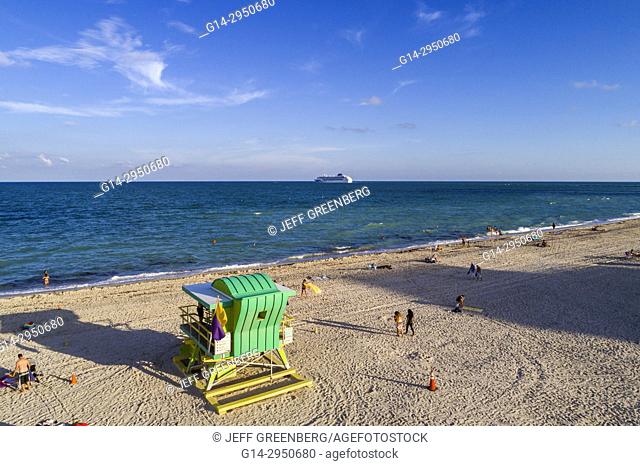 Florida, Miami Beach, water, sand, Atlantic Ocean, lifeguard station hut, departing cruise ship, aerial overhead bird's eye view above
