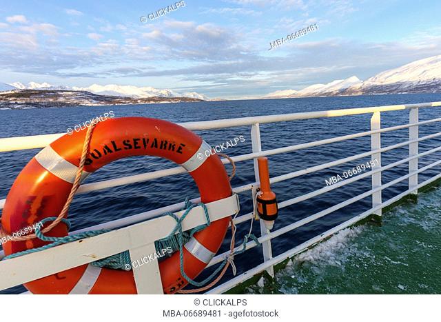 Lifebelt on board the ferry that sails into the fjord. Lyngenfjord, Lyngen Alps, Troms, Norway, Lapland, Europe
