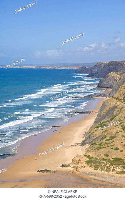 View along the south west coast of Portugal, Costa Vincentina, Praia do Castelejo and Cordama beaches from the clifftop above Vila do Bispo, Algarve, Portugal