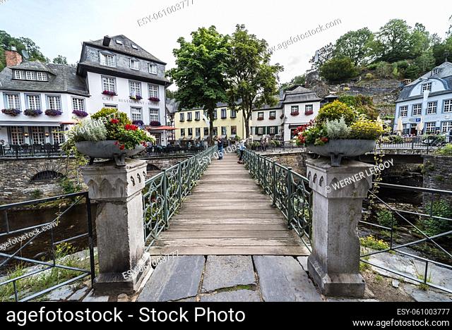 Monschau Old Town, North Rhine-Westphalia - Germany - 08 27 2019 Perspective view over the wooden pedestrian bridge