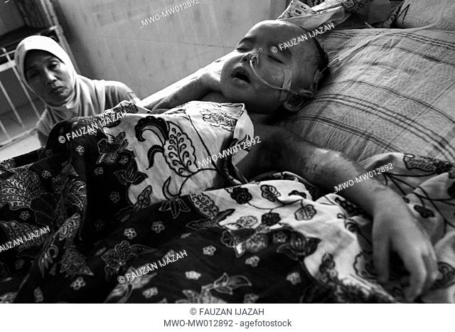 Darwis, 2, is hospitalised in the Zainoel Abidin Hospital for diarrhea The baby is from Lampakuk village in Aceh Besar, and has been in the hospital for a month...