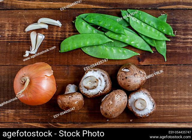 Cooking ingredients on rustic wooden background